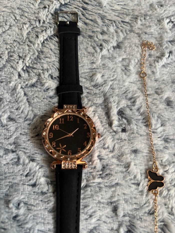 Jolie montre noire avec bracelet papillon - photo numéro 2