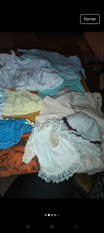 Lot ancien vêtements poupée 
J50