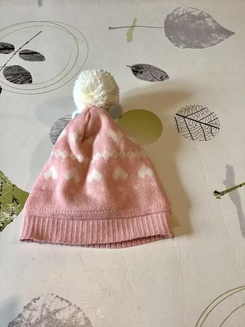 Bonnet rose clair et blanc avec pompon 2/3 ans