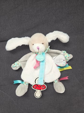 Doudou et compagnie chien Toopi attache tétine