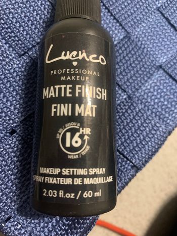 Spray fixateur