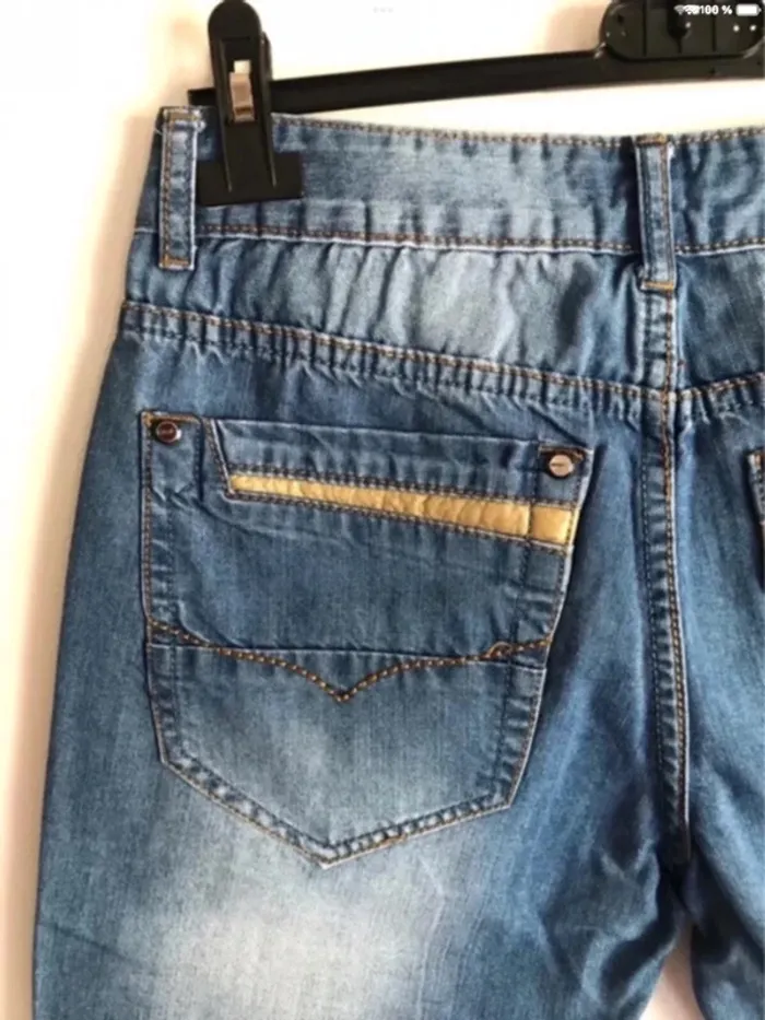 Bermuda homme en jean très léger effet troués taille 38 - photo numéro 9