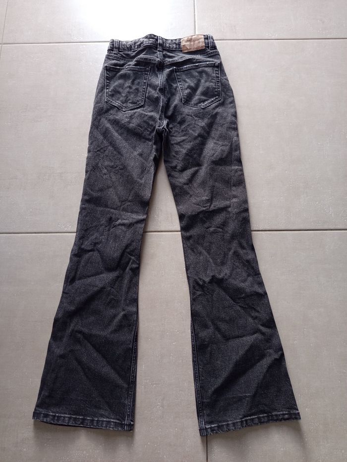 Très beau jean comme neuf à pattes d'éléphant - photo numéro 10