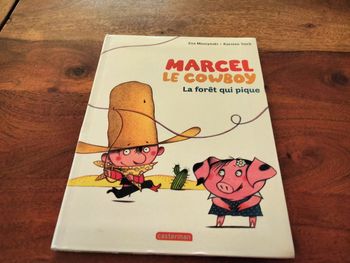 Livre intitulé Marcel le cowboy la forêt qui pique Casterman