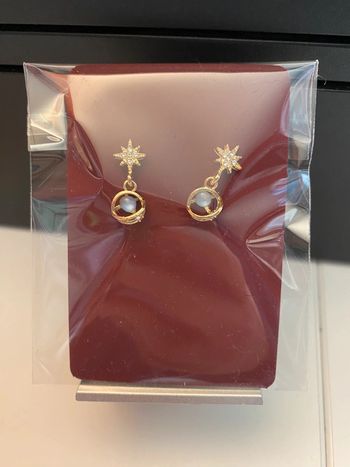 Idée cadeau Noël - Très jolies boucles d’oreille dorée étoile