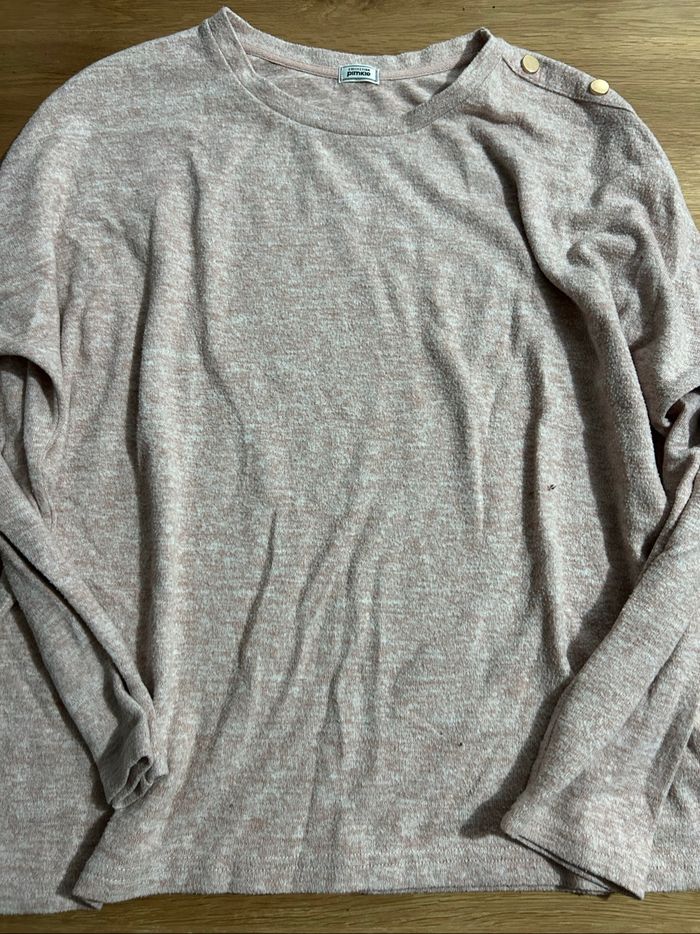 Pull rose moucheté