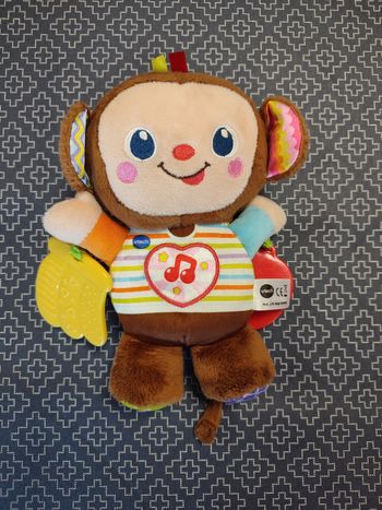 Singe peluche sonore