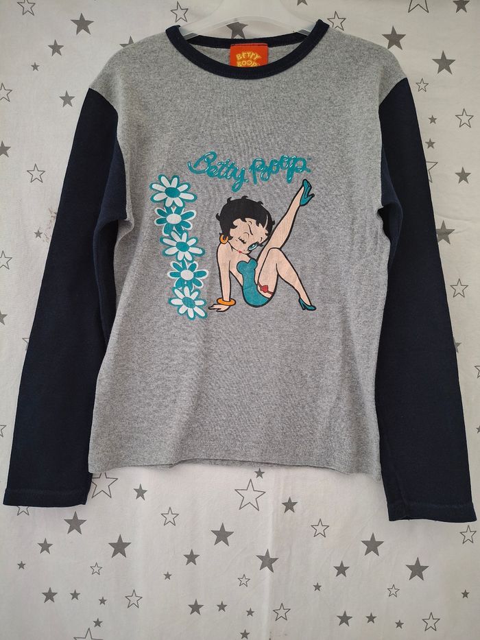 Tee-shirt gris manches longues noir 12 ans Betty Boop
Bon état ni trous ni tache - photo numéro 2