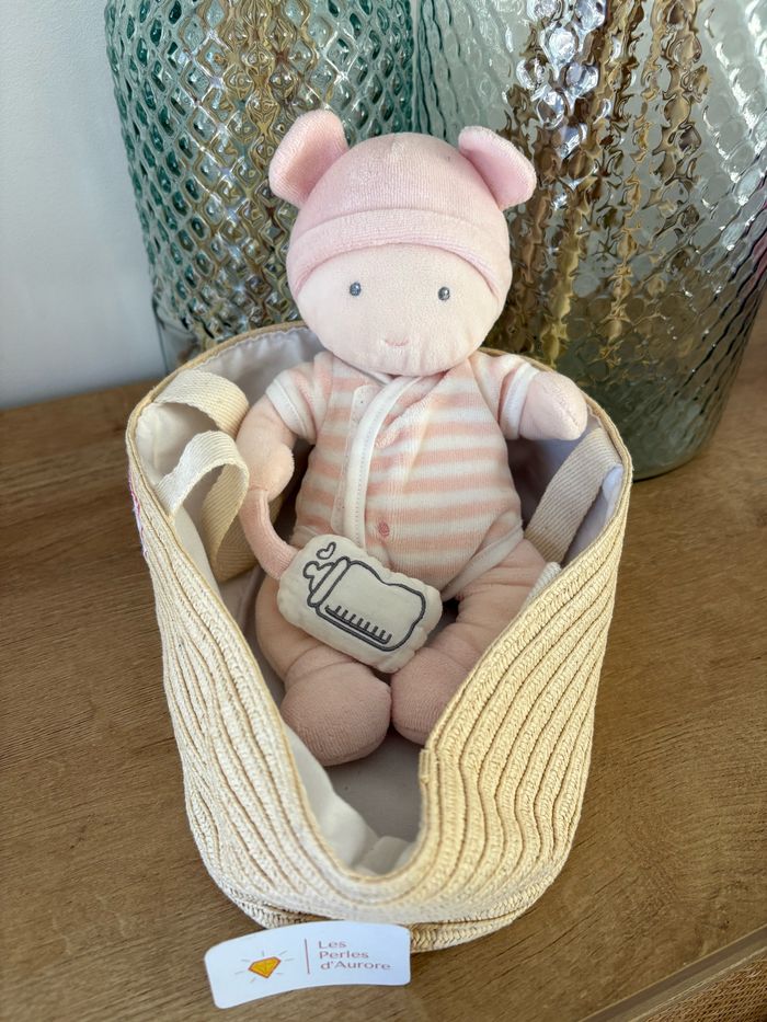 Poupon bébé couffin rose