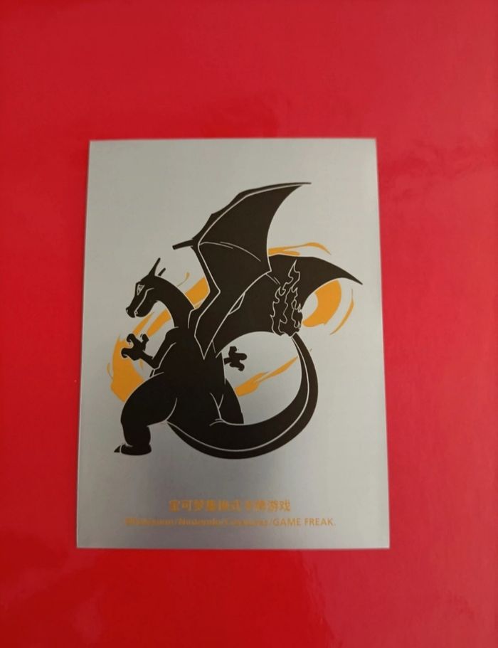 1 sleeve pokemon dracaufeu