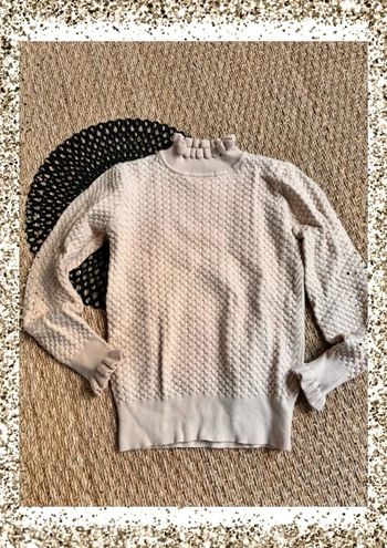 Pull beige col montant
