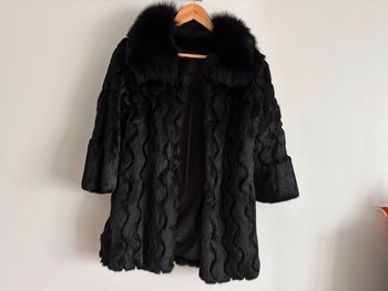 Manteau en fourrure taille L ( très agréable )