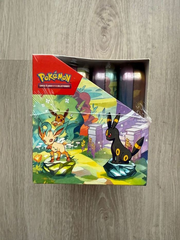 Display Pokémon Mini tins Évolutions Prismatiques EV8.5 Scellée - photo numéro 5