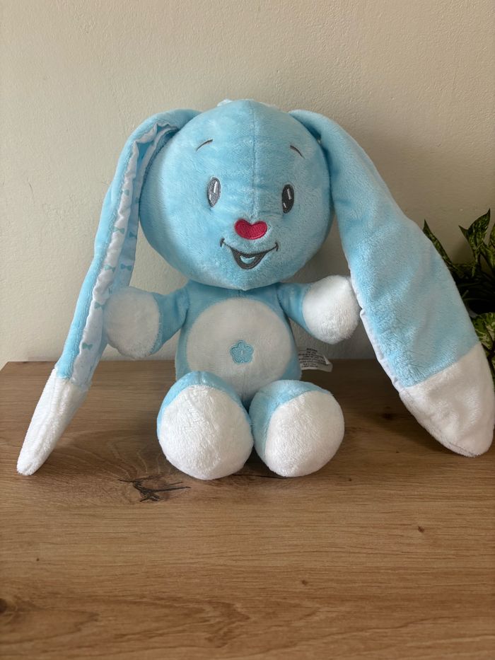 Doudou lapin bleu blanc grandes oreilles Auchan