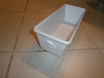 Moule allongé en plastique blanc