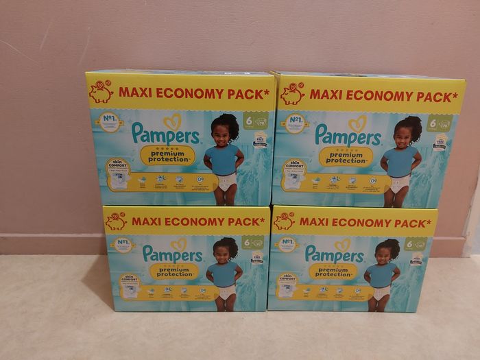 4 Maxi Économique pack de 70 couches pampers premium protection de 70 couches taille 6! Nb: 280 couches au total