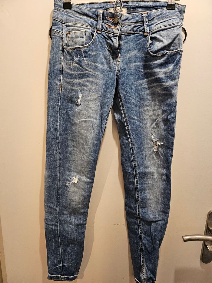 Jean effet délavé détail poche