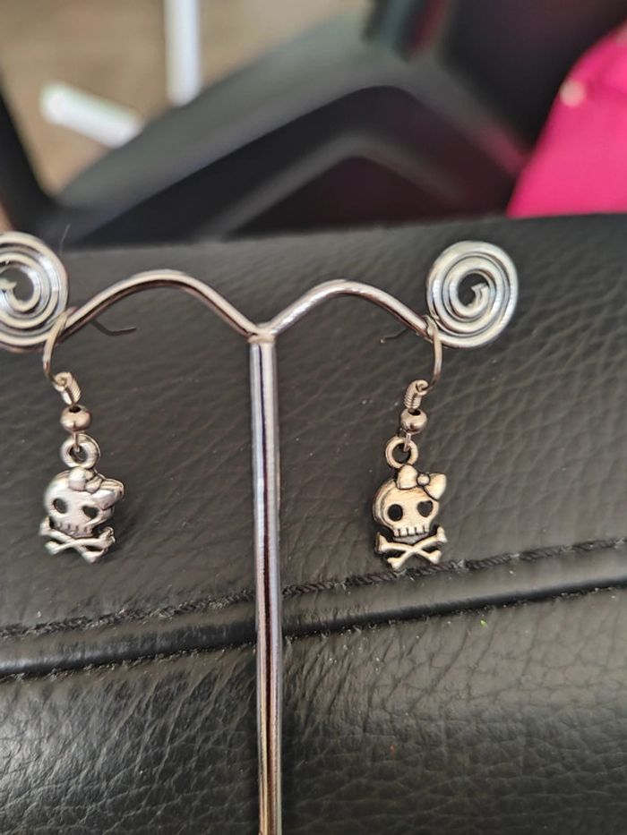 Boucles d'oreilles tête