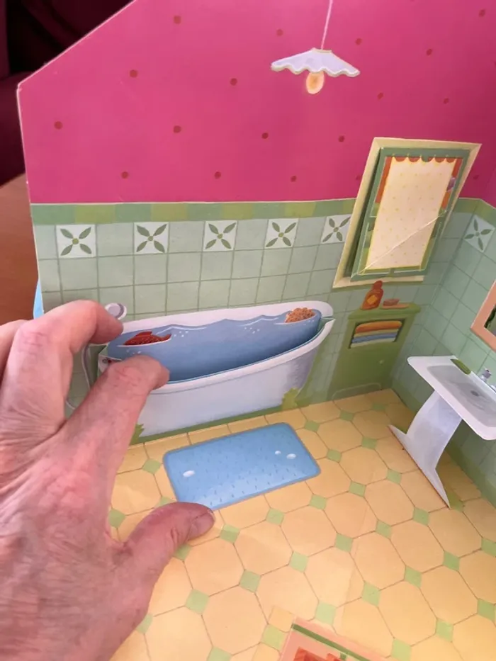 Livre carrousel + petite peluche 🧸 - photo numéro 7