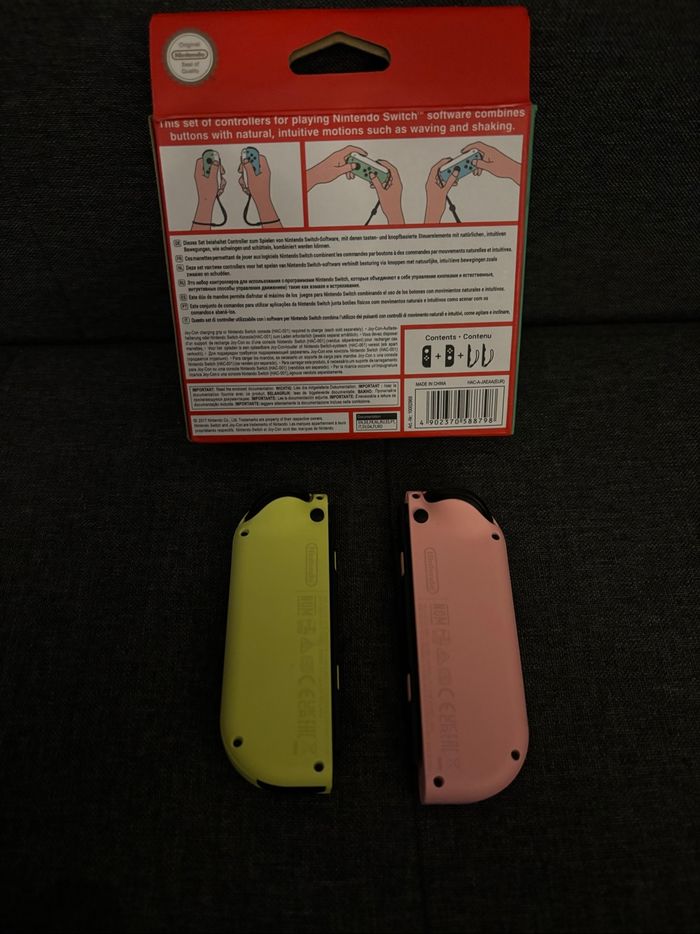 Paire de joycons rose et jaune officiels  Nintendo Switch - photo numéro 2