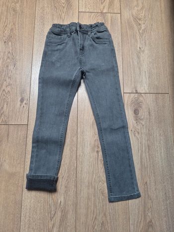Pantalon jeans slim tape à l'œil gris 6 ans en très bon état