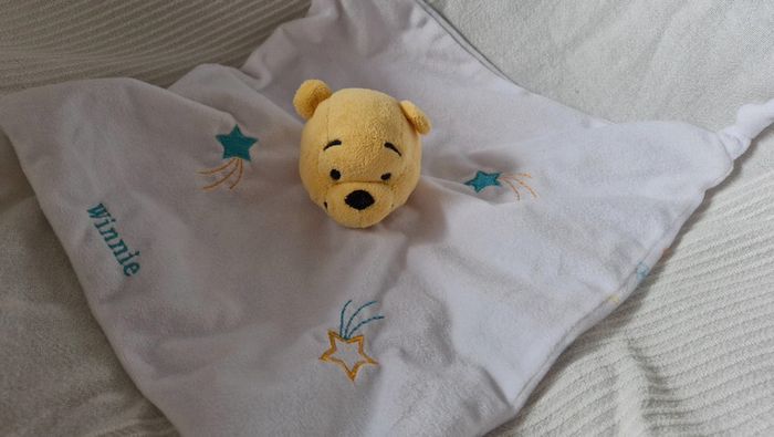 Doudou plat winnie l ourson nicotoy