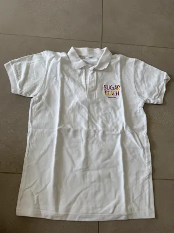Polo blanc taille M, très bon état