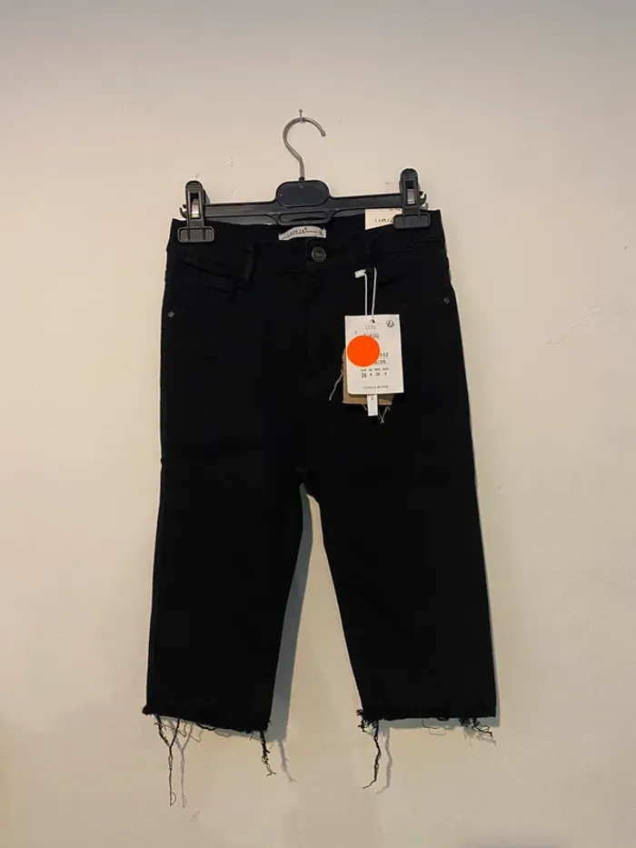 NP Jupe crayon moulante en jean extensible longueur genou taille haute