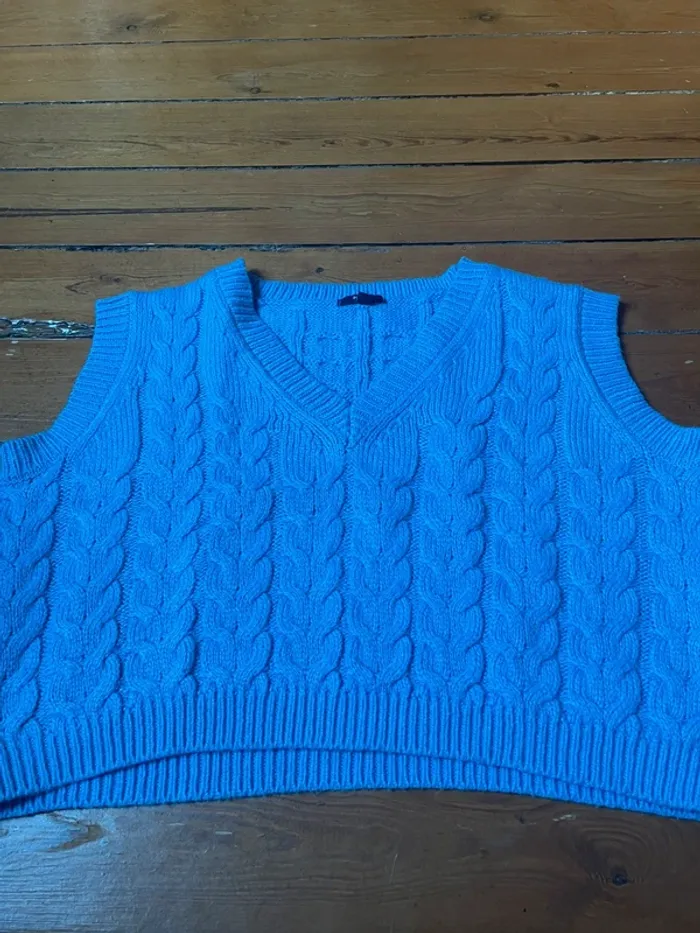 Petit pull sans manche