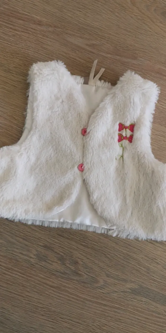 Gilet sans manche 9 mois