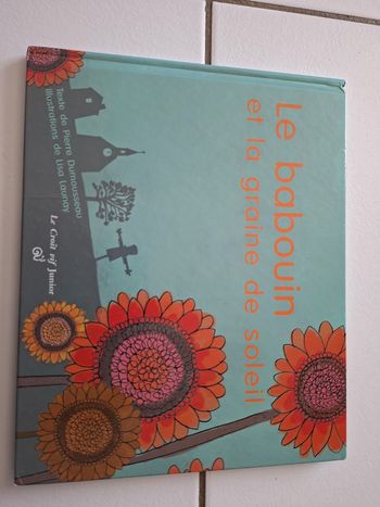 Le babouin et la graine de Soleil