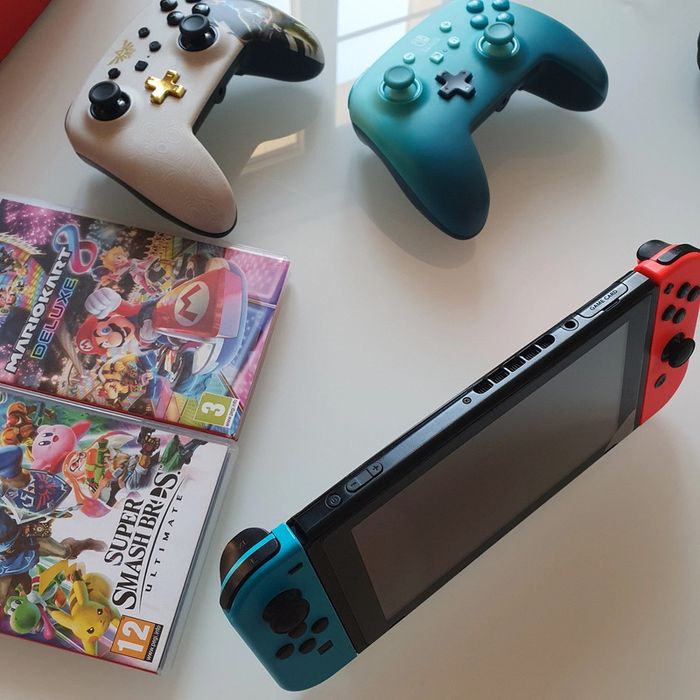 Switch complète + 2 jeux + 2 manettes - photo numéro 17