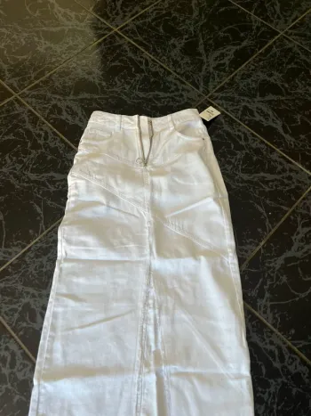 Jupe blanche 36 neuf pollué