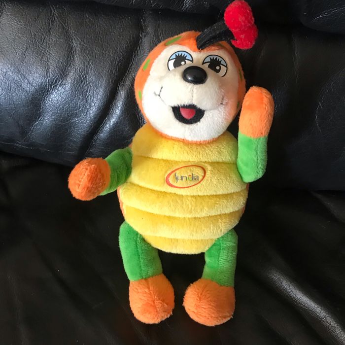 Doudou peluche sunny junelia coccinelle orange à pois vert 20cm