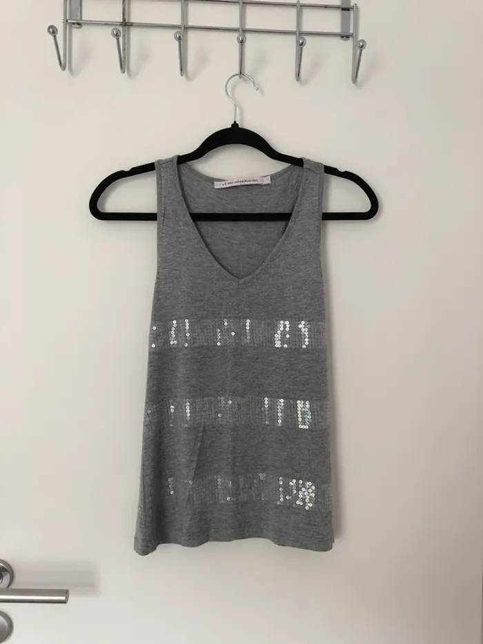 Débardeur gris à paillettes La Fée Maraboutée taille 1