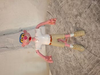 Figurine panthère rose golfeur