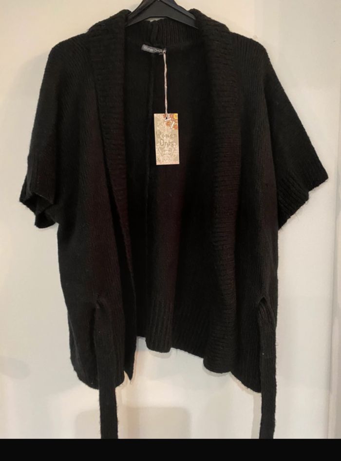 Gilet neuf manche courte 42/44