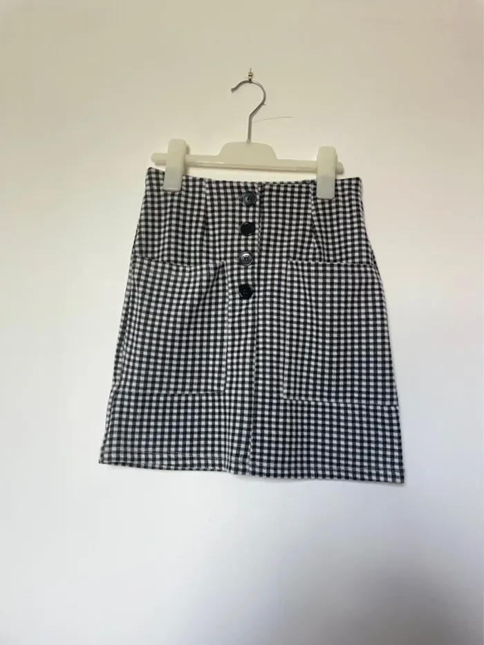 Mini-jupe à carreaux noir et blanc