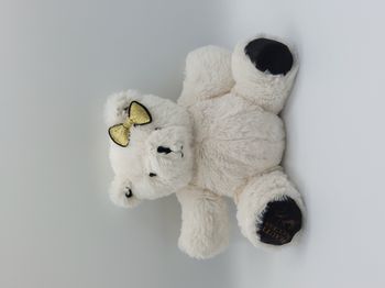 Peluche doudou ours blanc Beauty success Alexandra Lamy noeud doré 21 cm