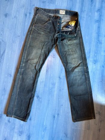 Jean brut blanchi Wrangler W31 L32 crank