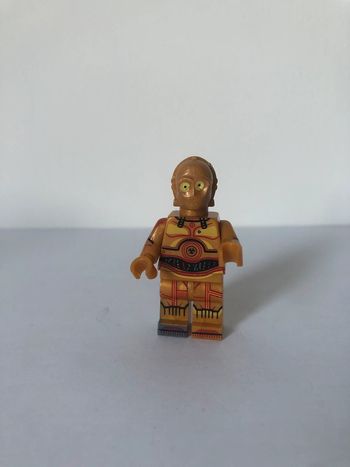 Figurine type lego droïde C3PO. Star Wars
