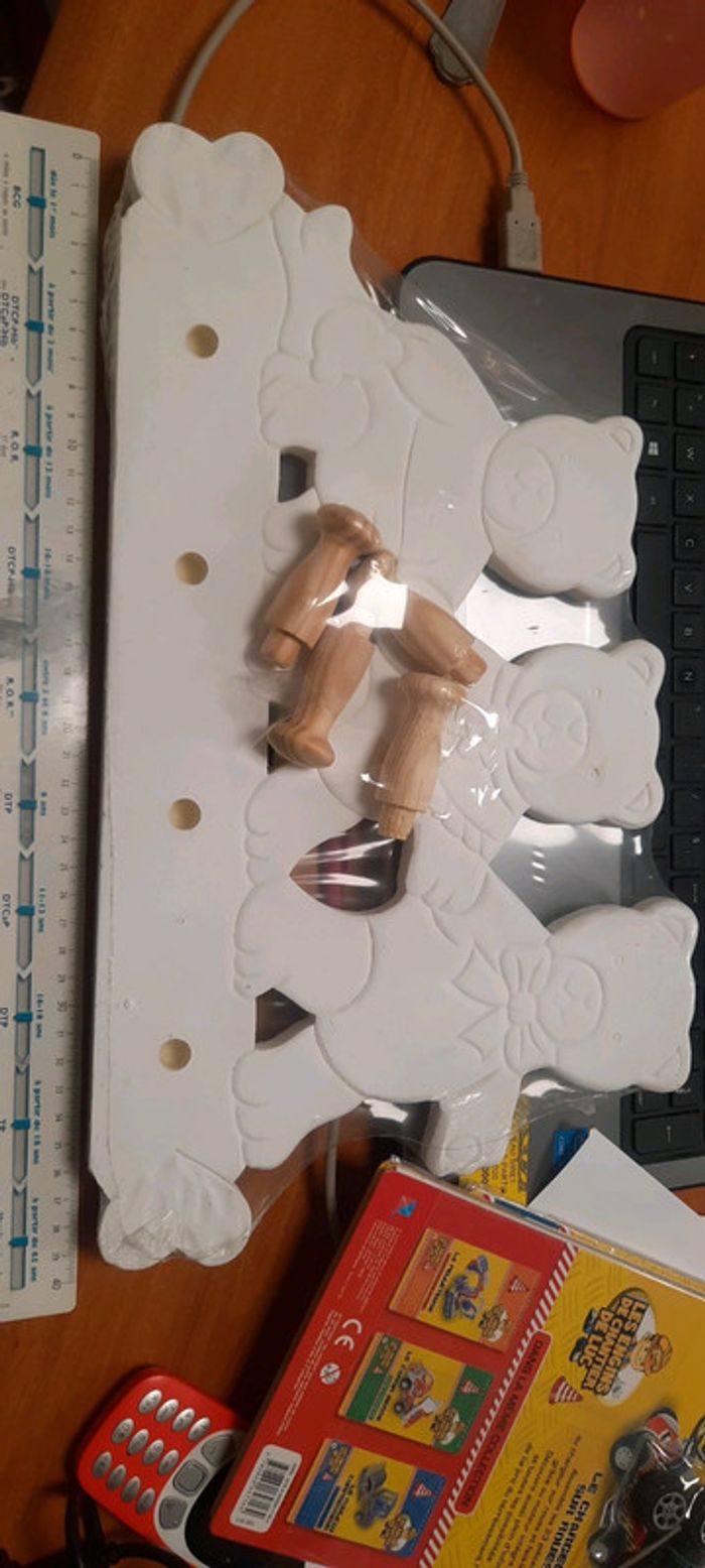 Porte manteau 4 boutons