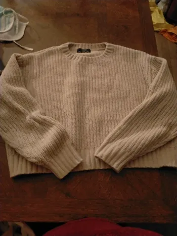 Pull taille s