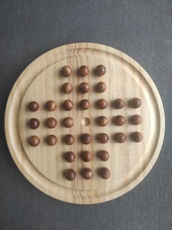 Jeu du solitaire en bois