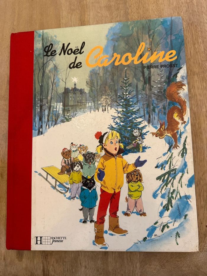 Grand livre Le Noël de Caroline fête hiver reliure rouge état satisfaisant Pierre Probst