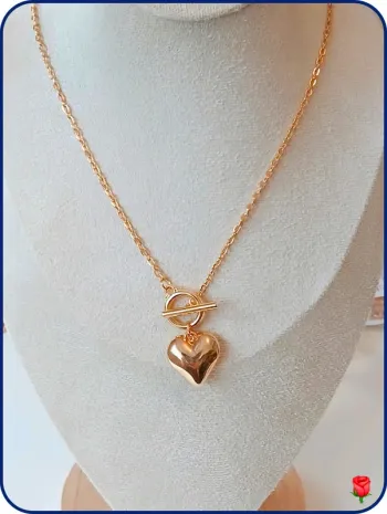 Collier doré pendentif cœur bombé avec fermoir en T