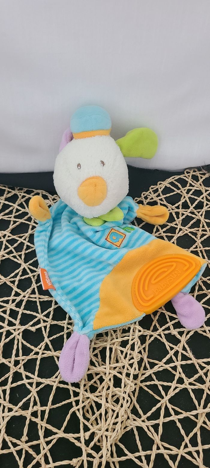 Doudou plat chien bleu orange vert mauve ahoy BABYSUN