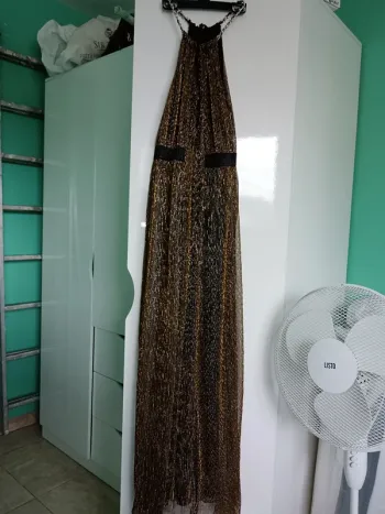 Robe sans manches noir et doré avec élastique noir taille M