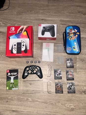 Nintendo switch oled + fc25 + Nintendo switch online (11mois)