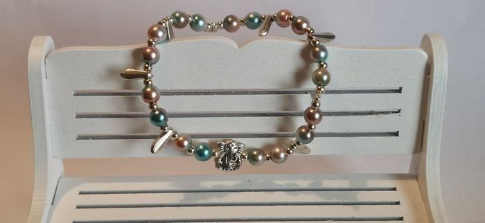 Bracelet fantaisie "Ganesh"
(sur élastique 1.0 donc élasticité modérée)